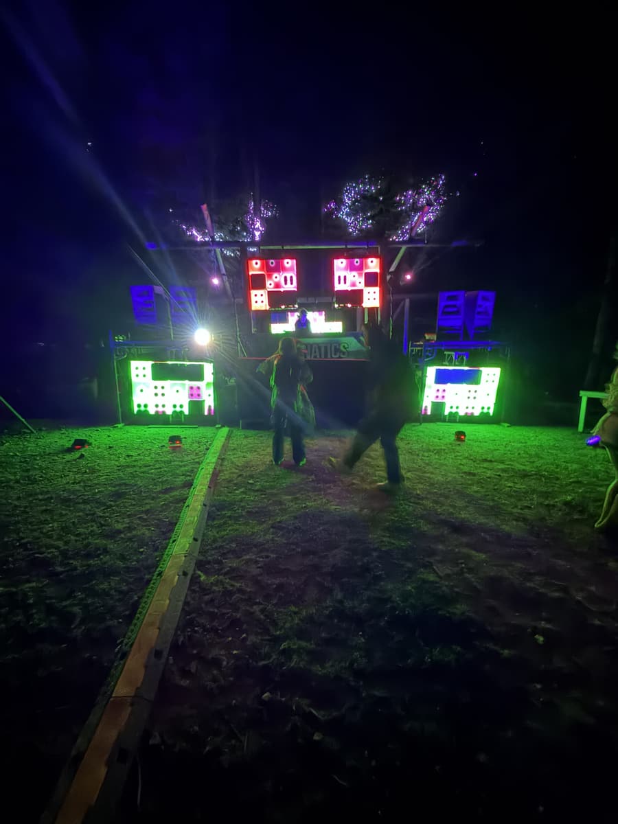 LED-lit night stage in the woods